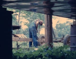 Man building house boat trailor